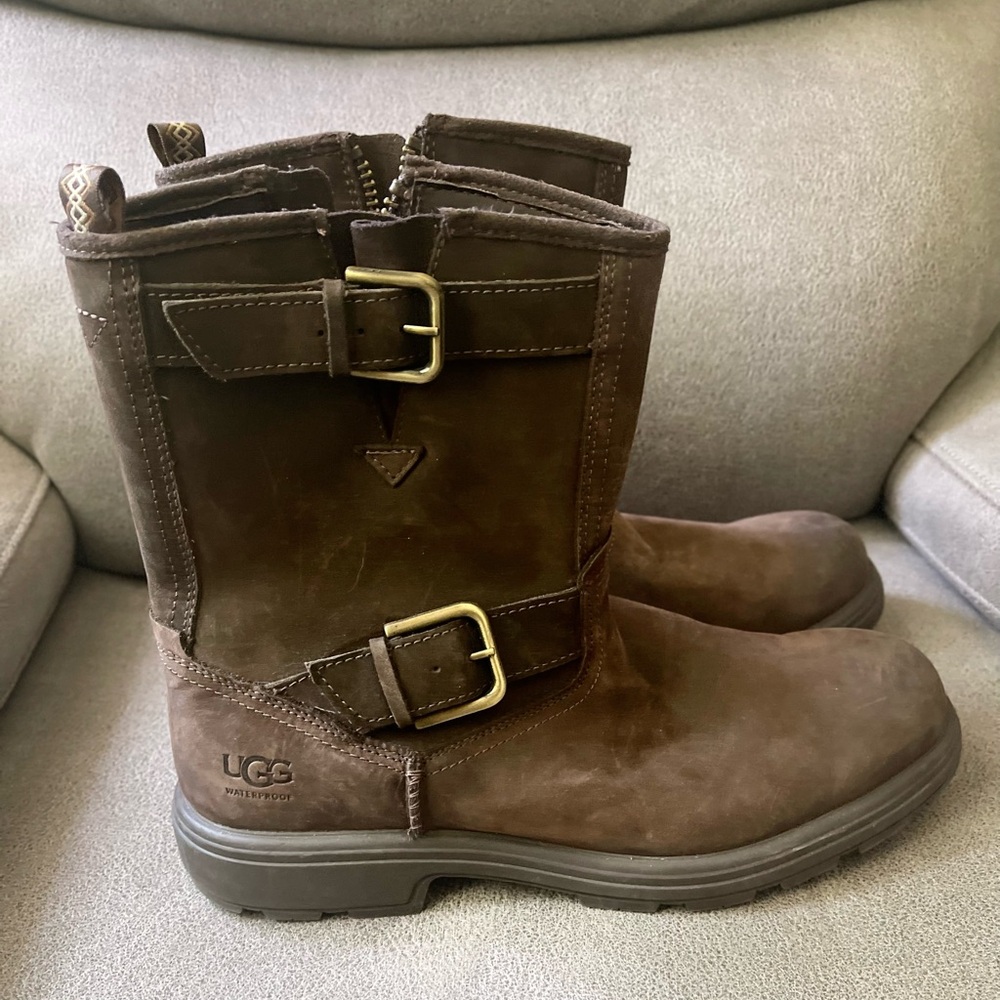 USED. Ugg All weather leather boots. 10.5, Brown, buckle and side zippers.